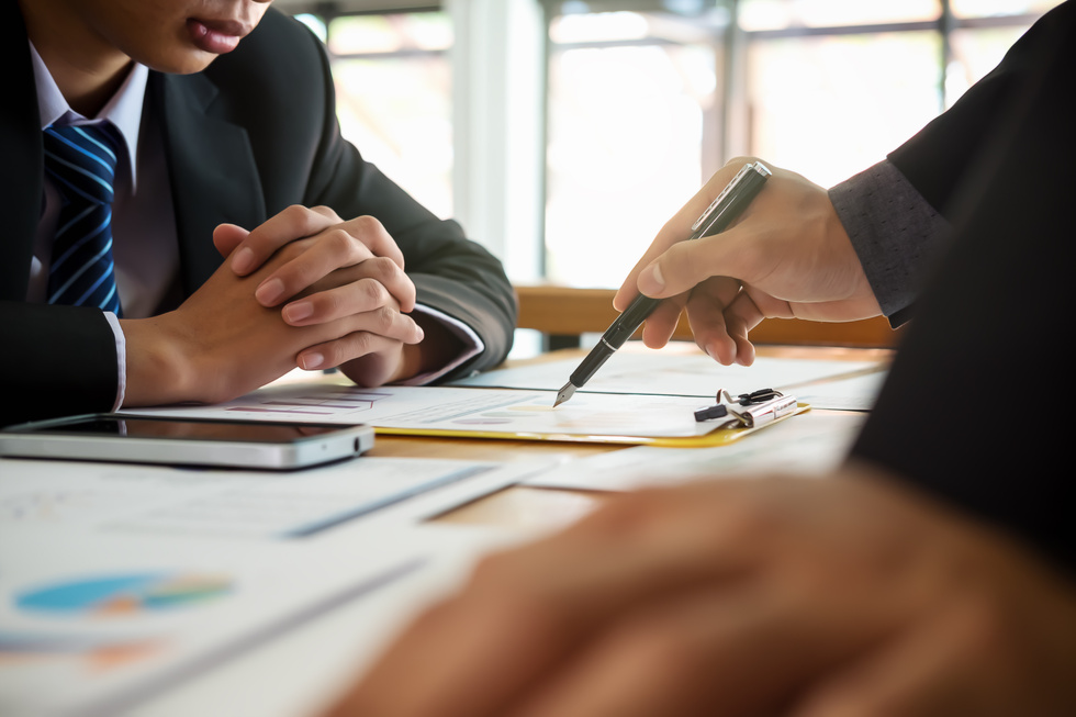 Business Meeting with Documents on the Table